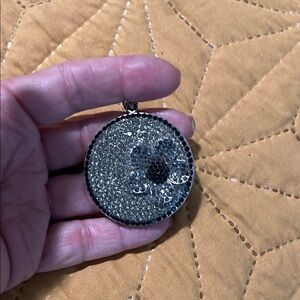 Pave Chrystal Round Pendant with raised 3D daisy.